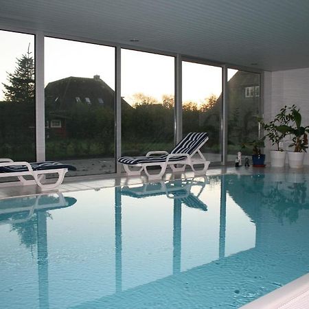 Ferienwohnungen Im Hotel Garni Zur Post Utersum Ruang foto