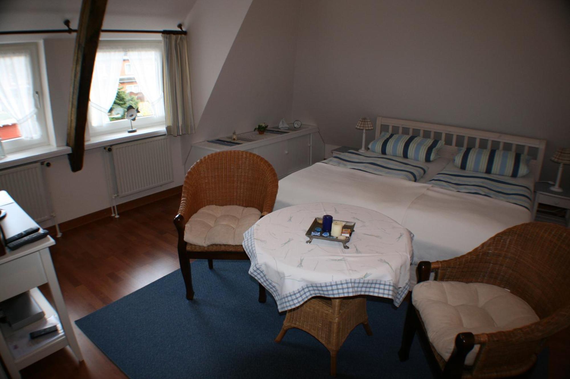Ferienwohnungen Im Hotel Garni Zur Post Utersum Ruang foto