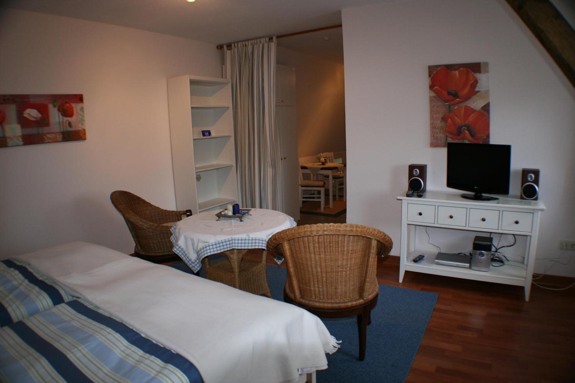 Ferienwohnungen Im Hotel Garni Zur Post Utersum Ruang foto