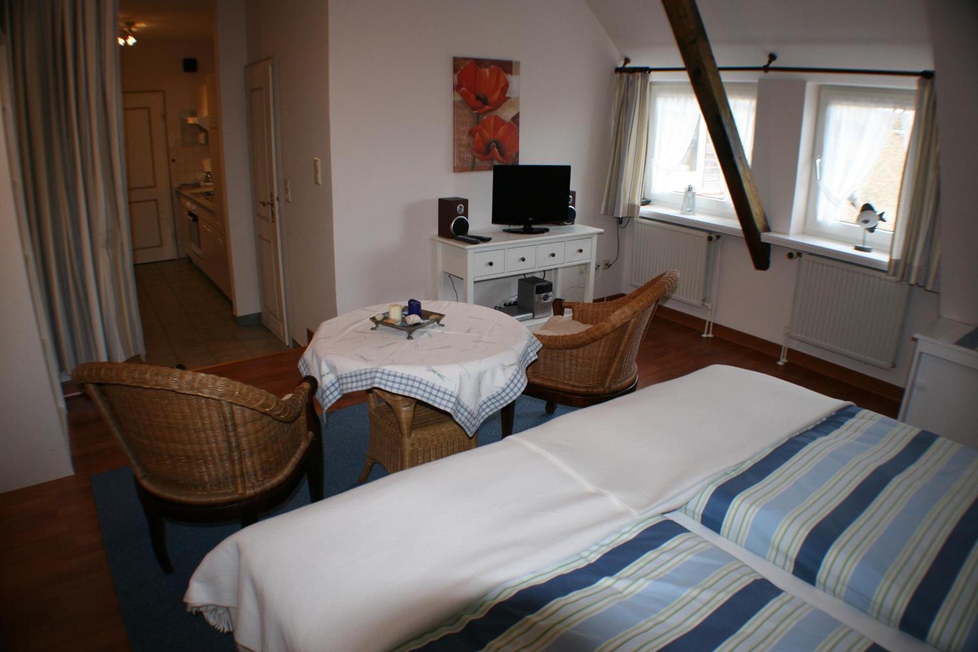 Ferienwohnungen Im Hotel Garni Zur Post Utersum Ruang foto